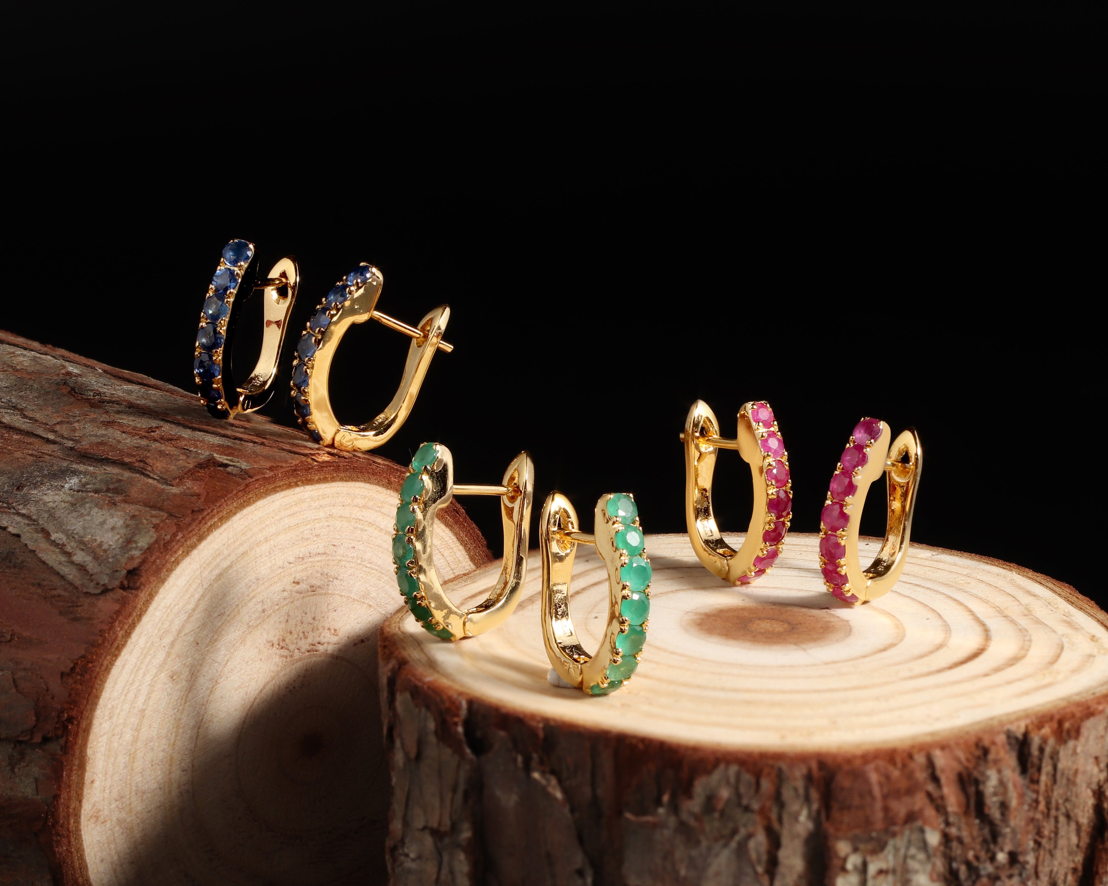 Gold plated statement earrings with refined gemstone detailing