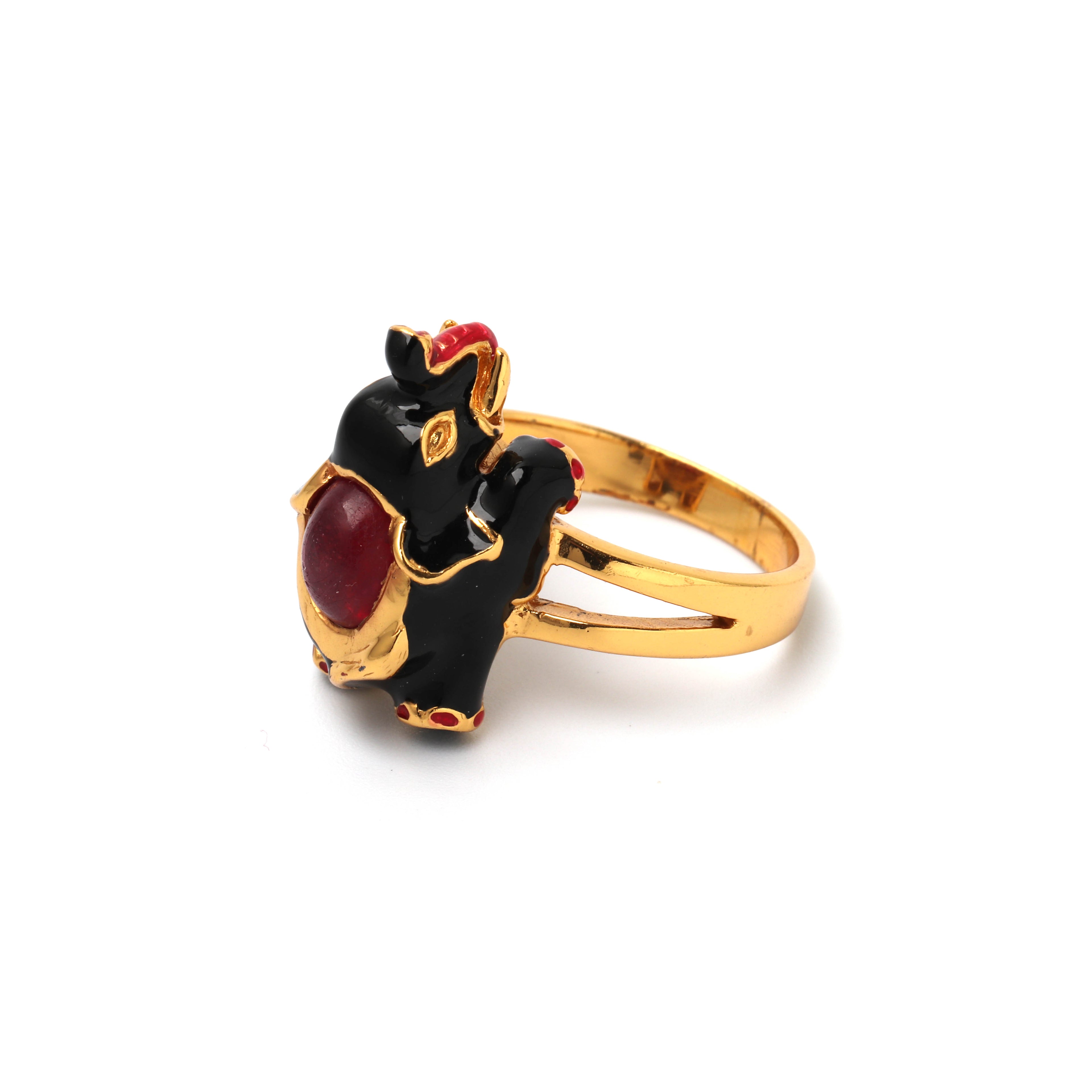 Elegant sterling silver elephant ring with natural ruby centerpiece