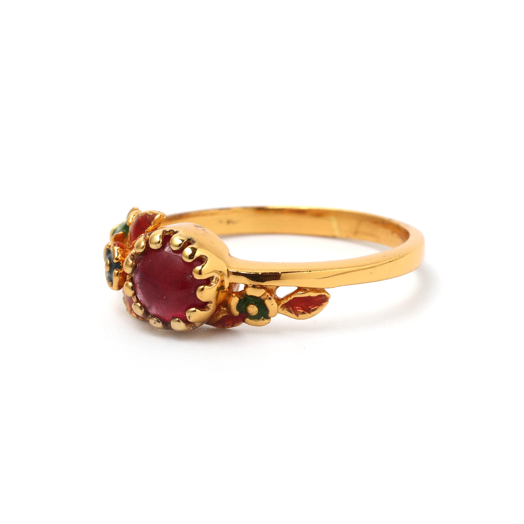 Elegant ruby gemstone ring with floral design and gold plated finish