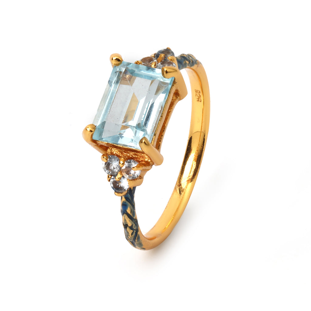 Minimalist blue topaz solitaire ring handcrafted in sterling silver