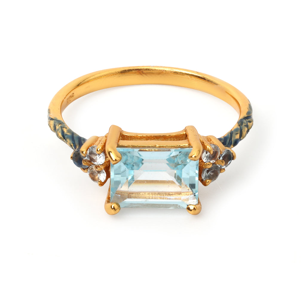 Gold plated blue topaz ring in 925 sterling silver with emerald cut gemstone