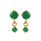Emerald gemstone earrings with gold-tone settings and dangling design