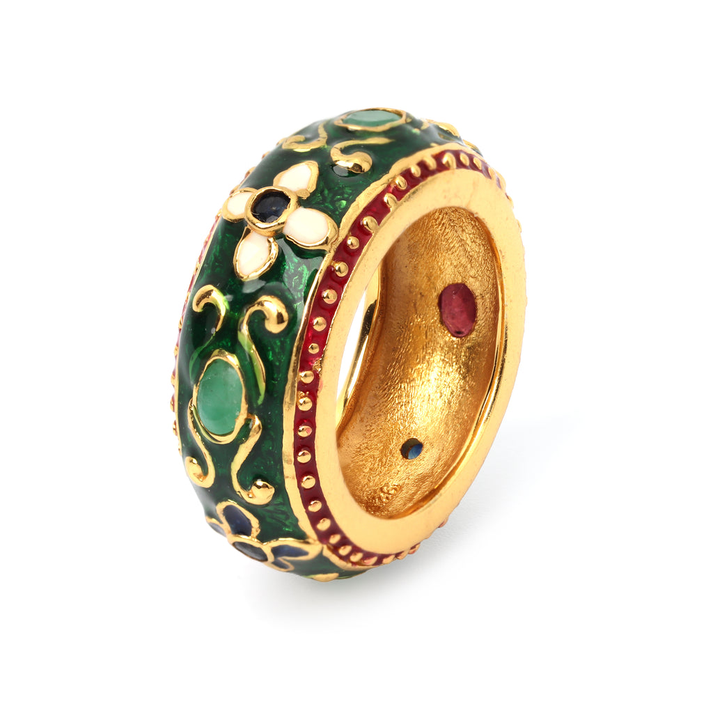 Handcrafted emerald statement ring featuring floral enamel details