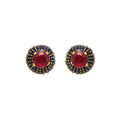 Ruby stud earrings in 14K gold plated sterling silver with black enamel detailing