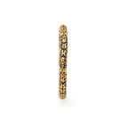 Gold ring with intricate black enamel detailing, elegant and timeless design