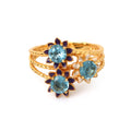 Gold plated blue topaz floral ring in 925 sterling silver
