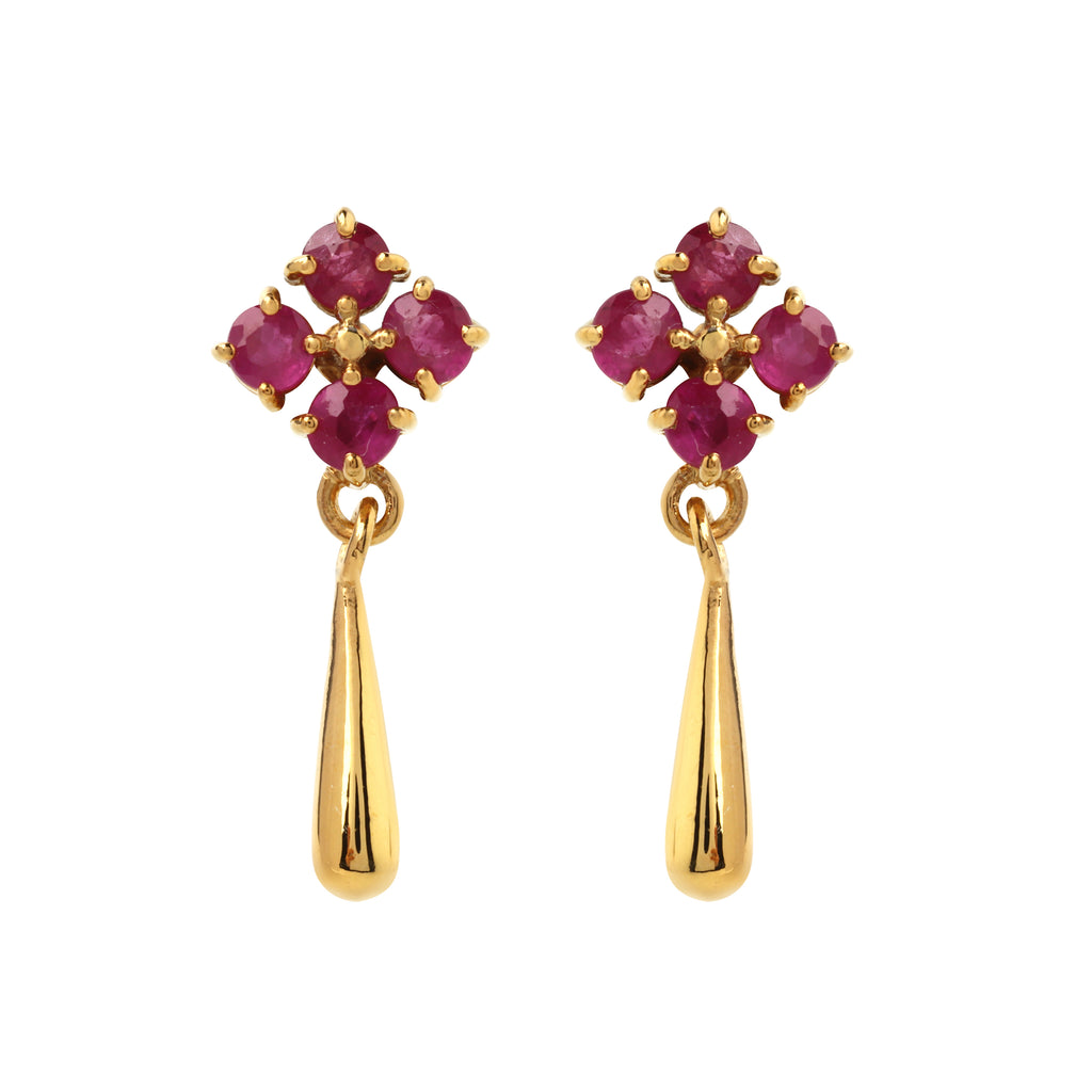 Close-up of ruby drop earrings in 925 sterling silver with gold finish, floral cluster setting by Jewelry by Crimson