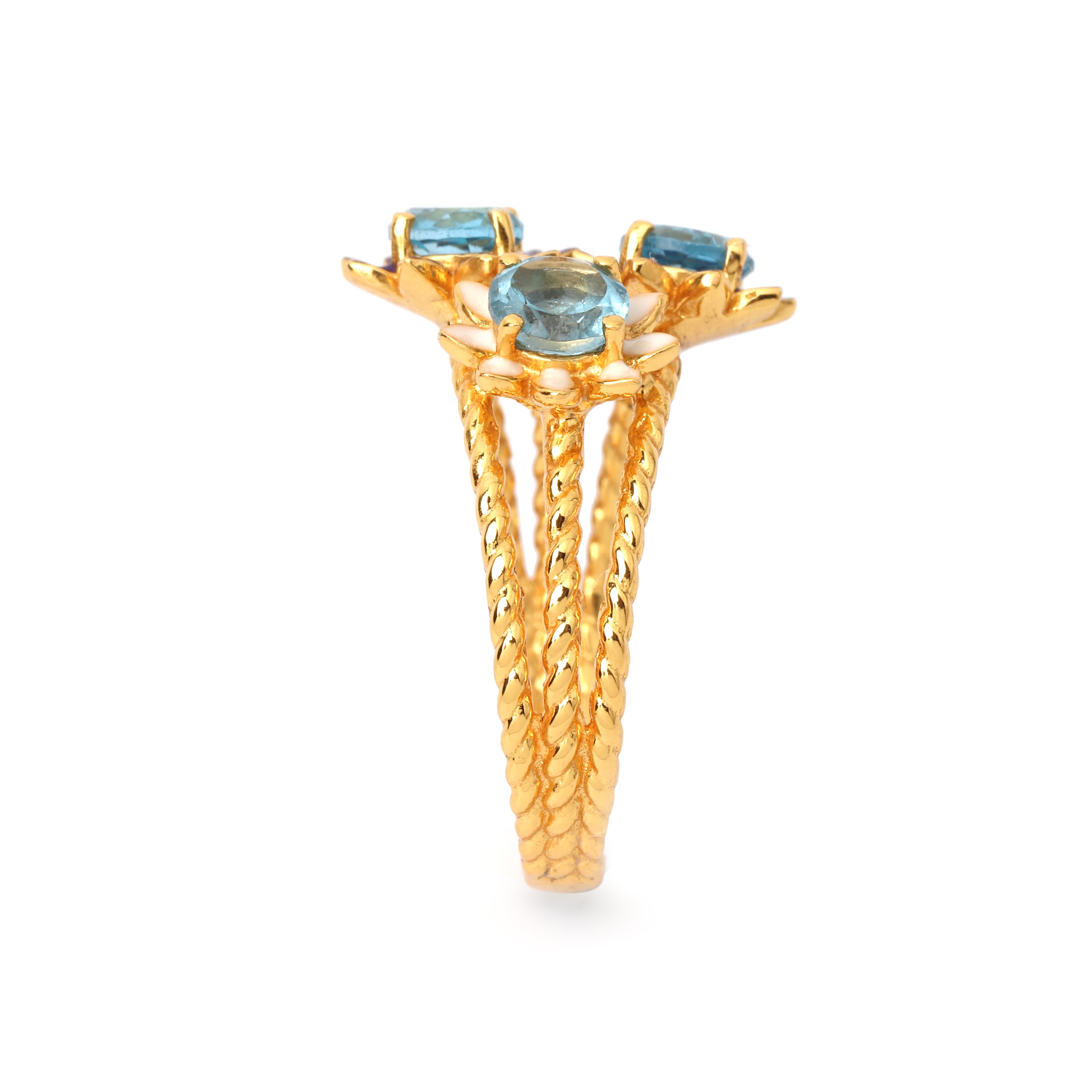 Handcrafted blue topaz ring with floral enamel details