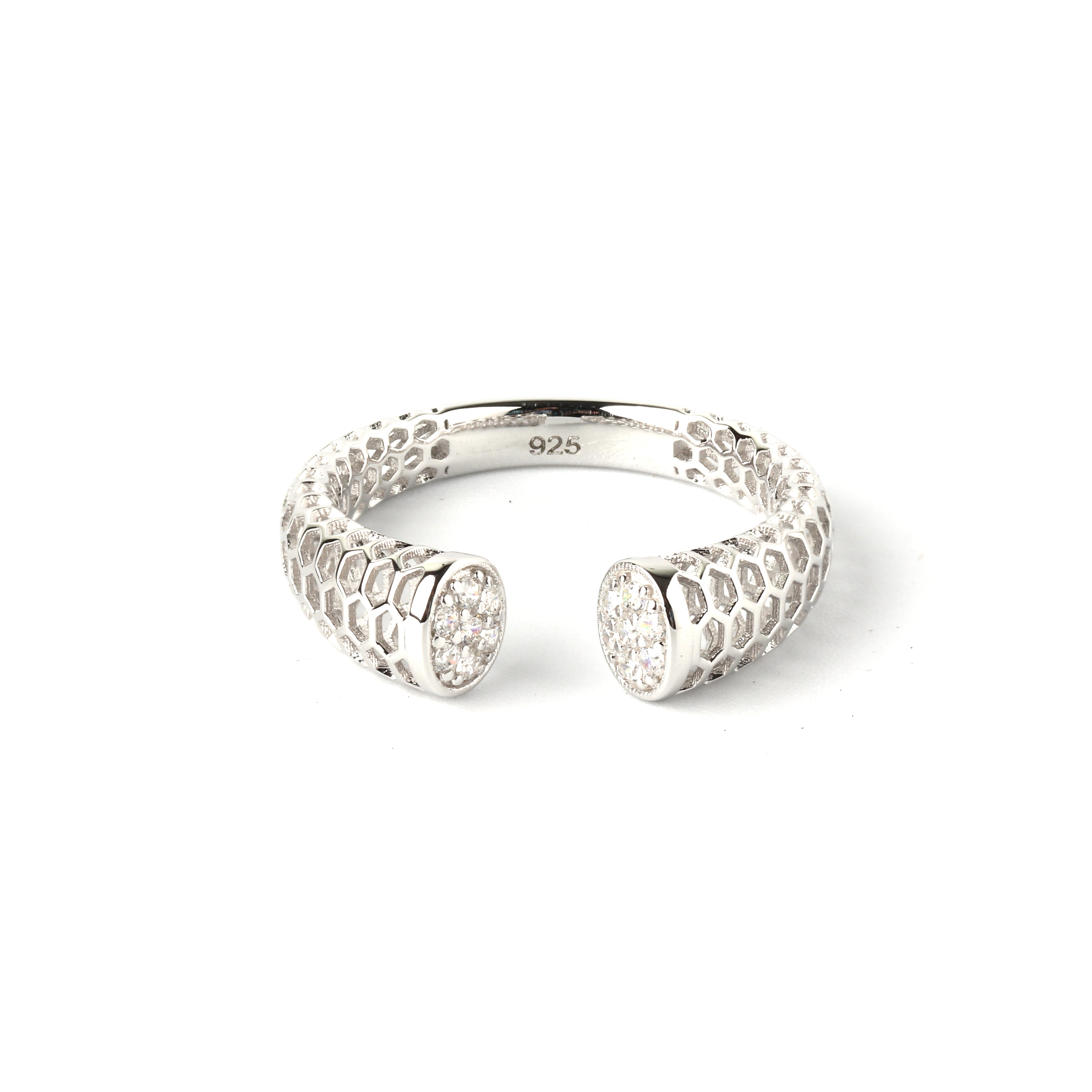 Detail view of hexagonal honeycomb texture on polished 925 sterling silver open ring
