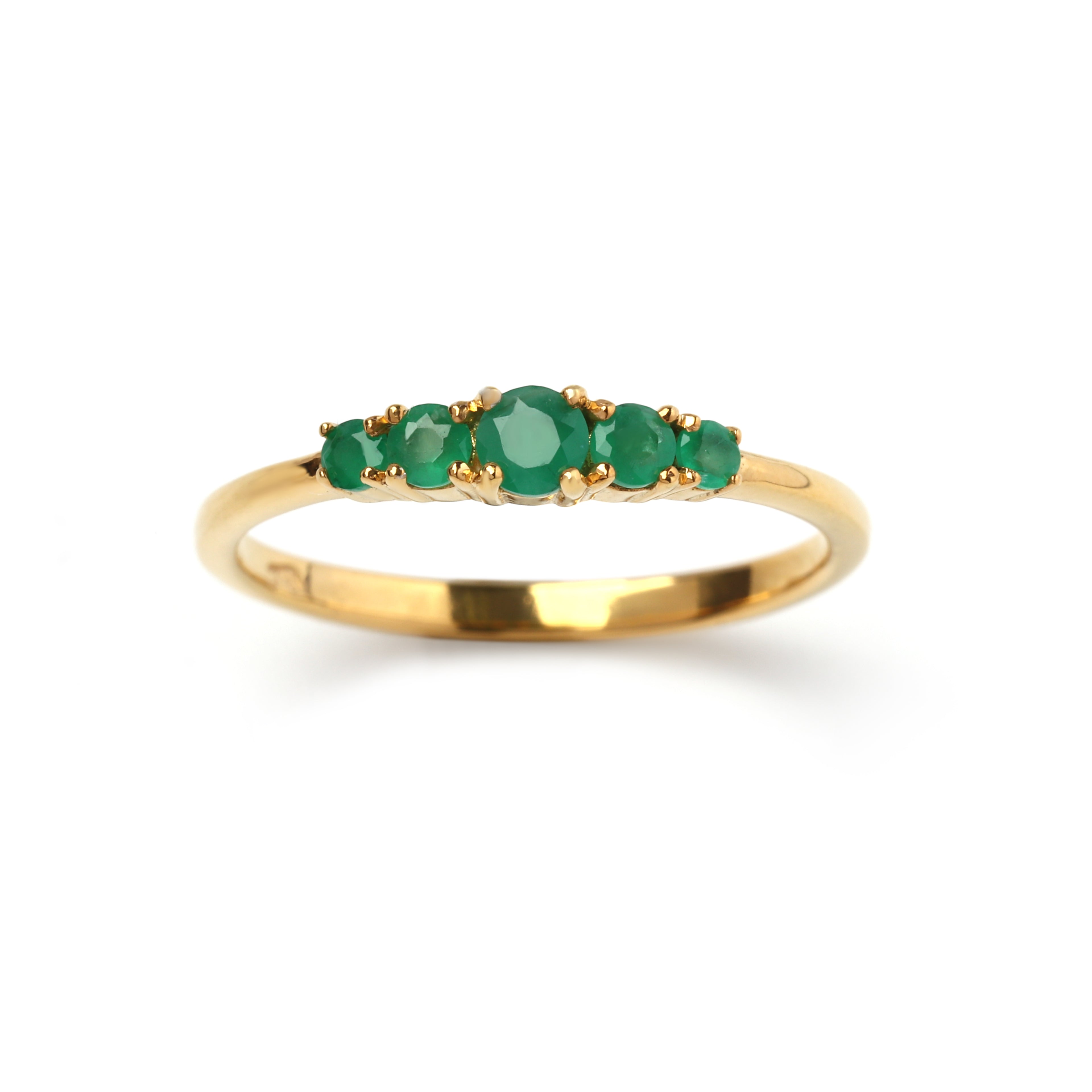 Close-up of emerald five-stone ring in 925 sterling silver gold finish by Jewelry by Crimson