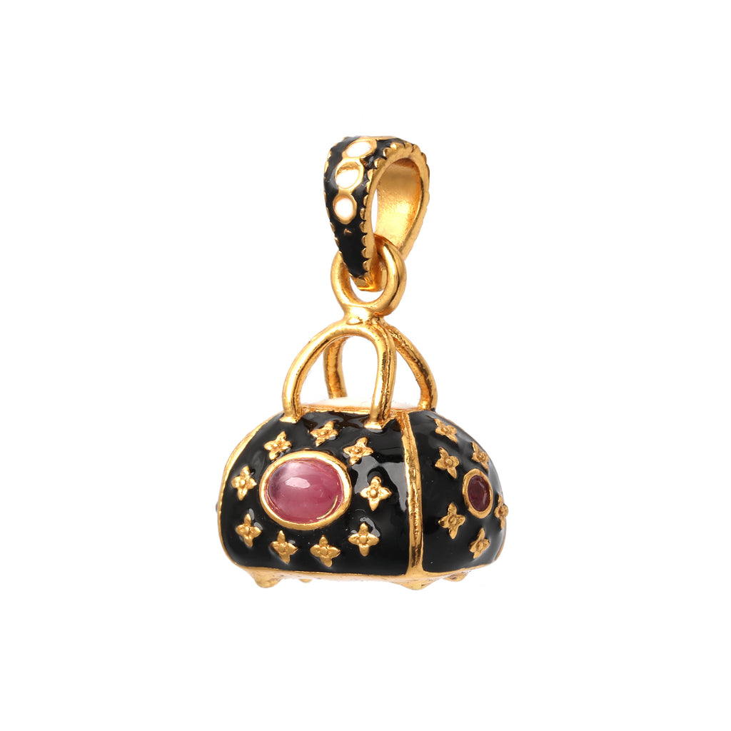 Vintage purse pendant with ruby gemstone and black enamel finish