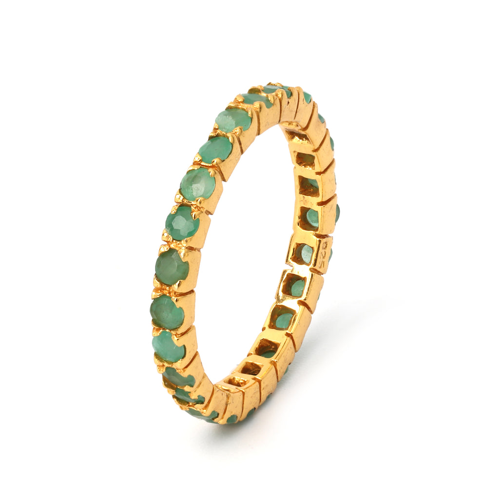 Minimalist emerald band ring with green gemstones