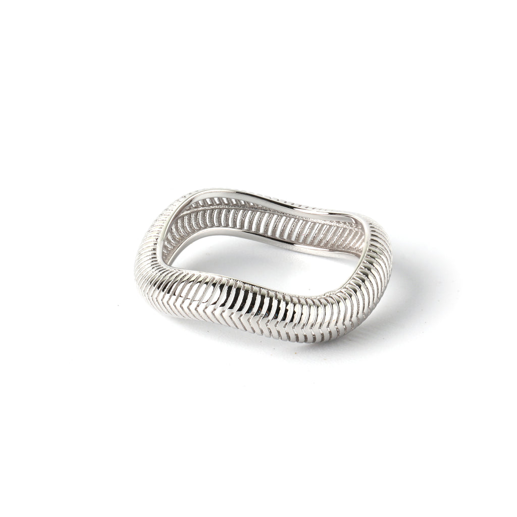 Close-up of 925 sterling silver square cut-out ring with textured finish by Jewelry by Crimson