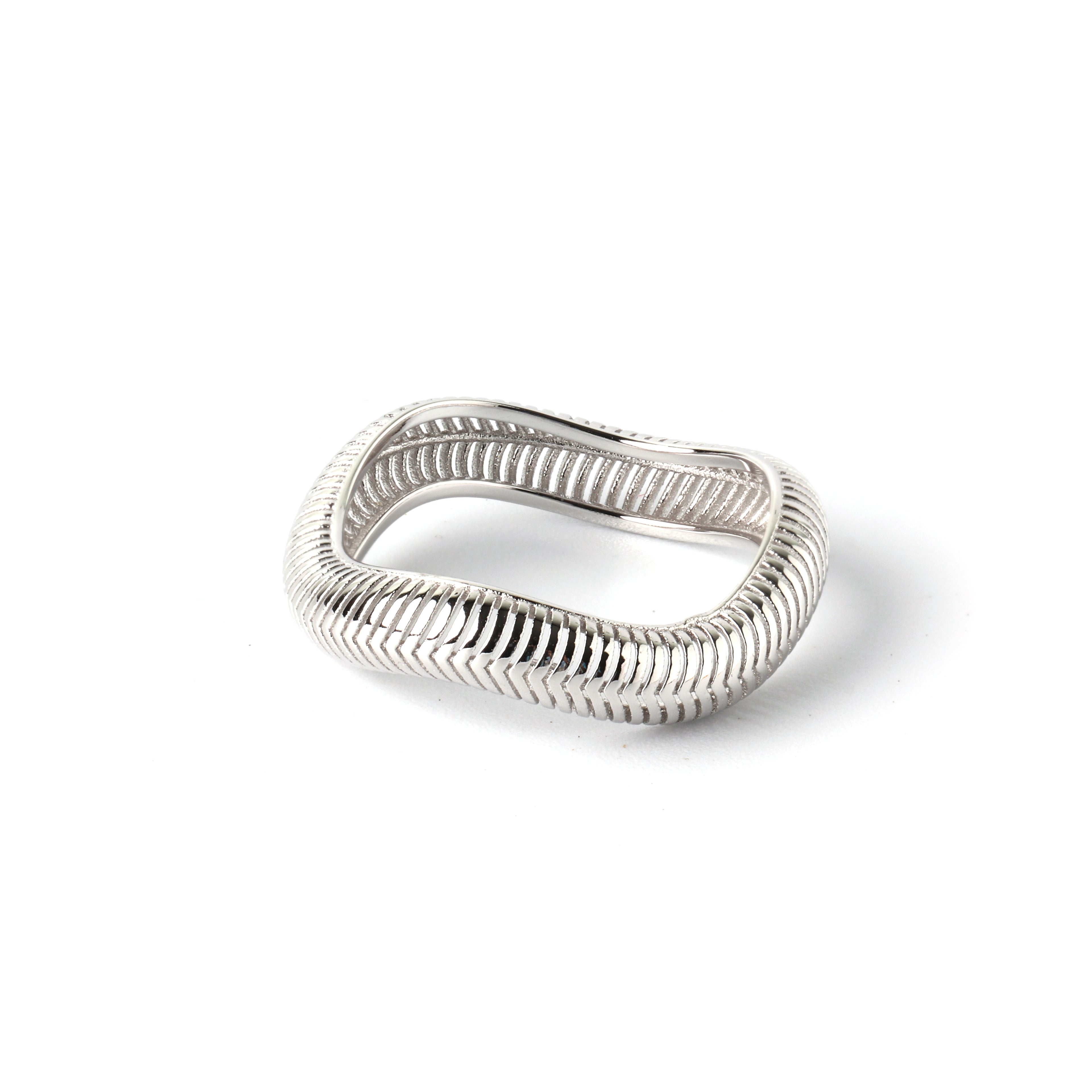 Close-up of 925 sterling silver square cut-out ring with textured finish by Jewelry by Crimson