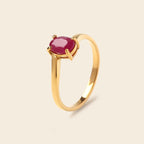 Gold ring with oval ruby gemstone, elegant solitaire design