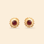 Gold stud earrings with red gemstones and textured bezel, handcrafted sterling silver jewelry