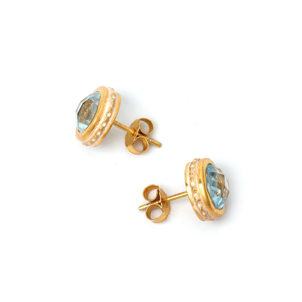 Handcrafted blue topaz bezel earrings with gold plated finish