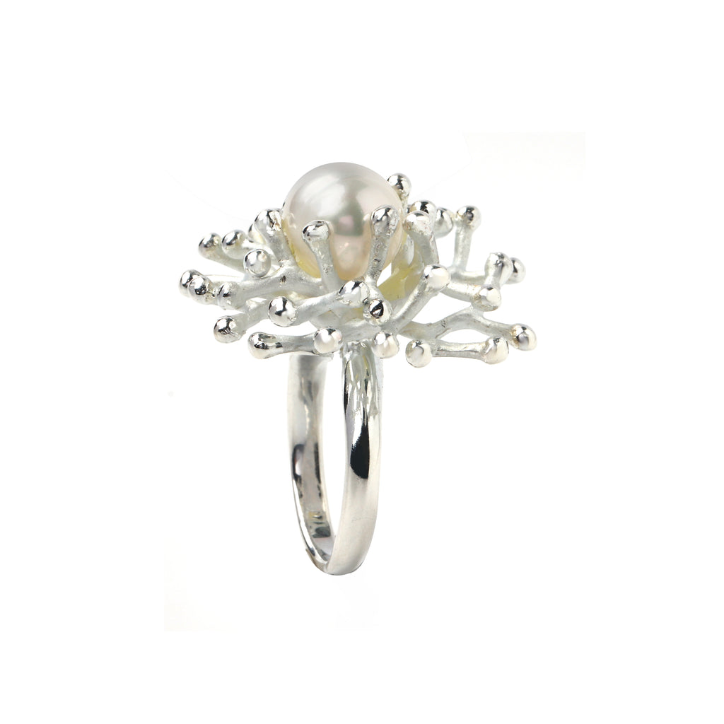 Artisan pearl ring with sculptural silver detailing