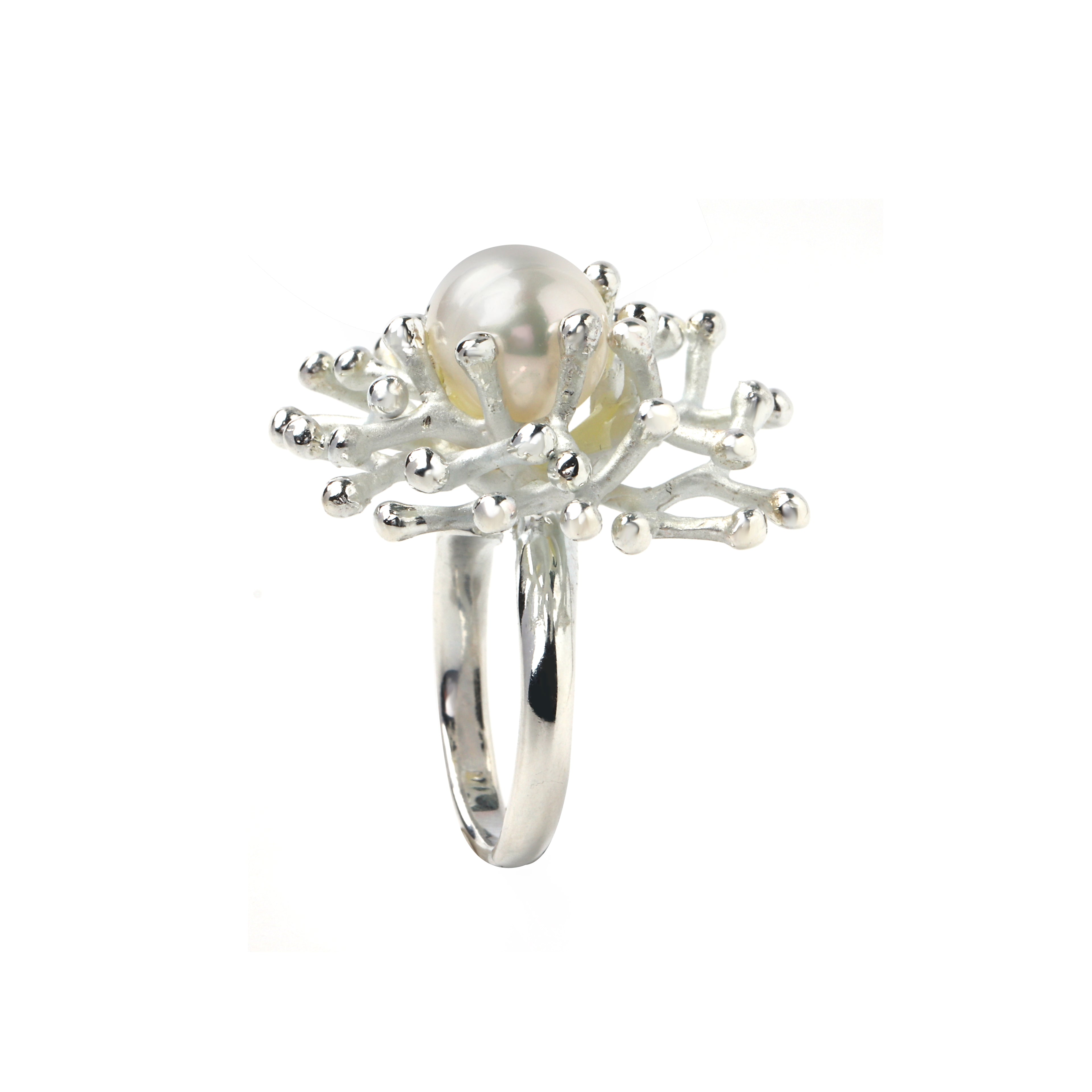 Artisan pearl ring with sculptural silver detailing