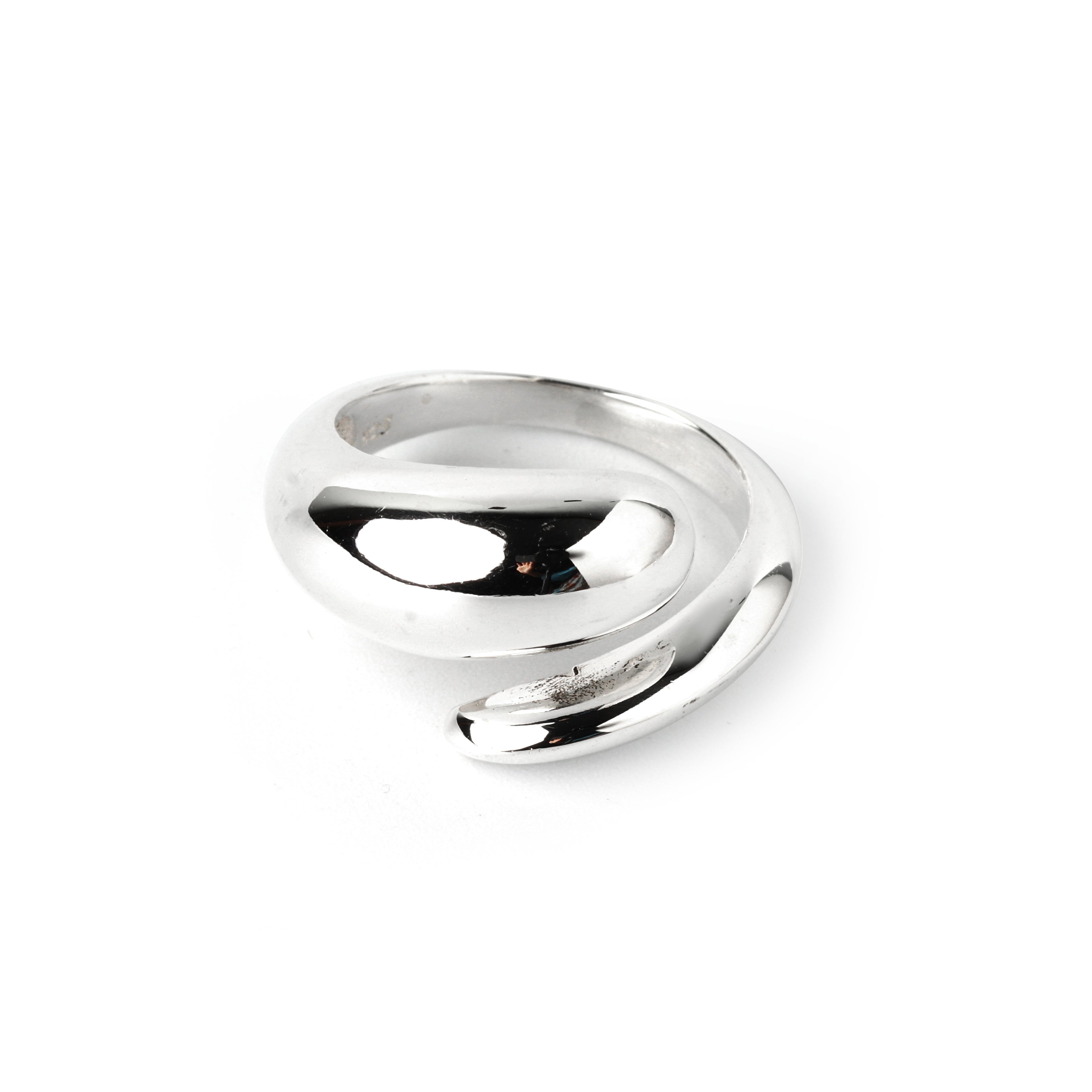 Close-up of 925 sterling silver wave ring with high-polish sculpted curve design by Jewelry by Crimson