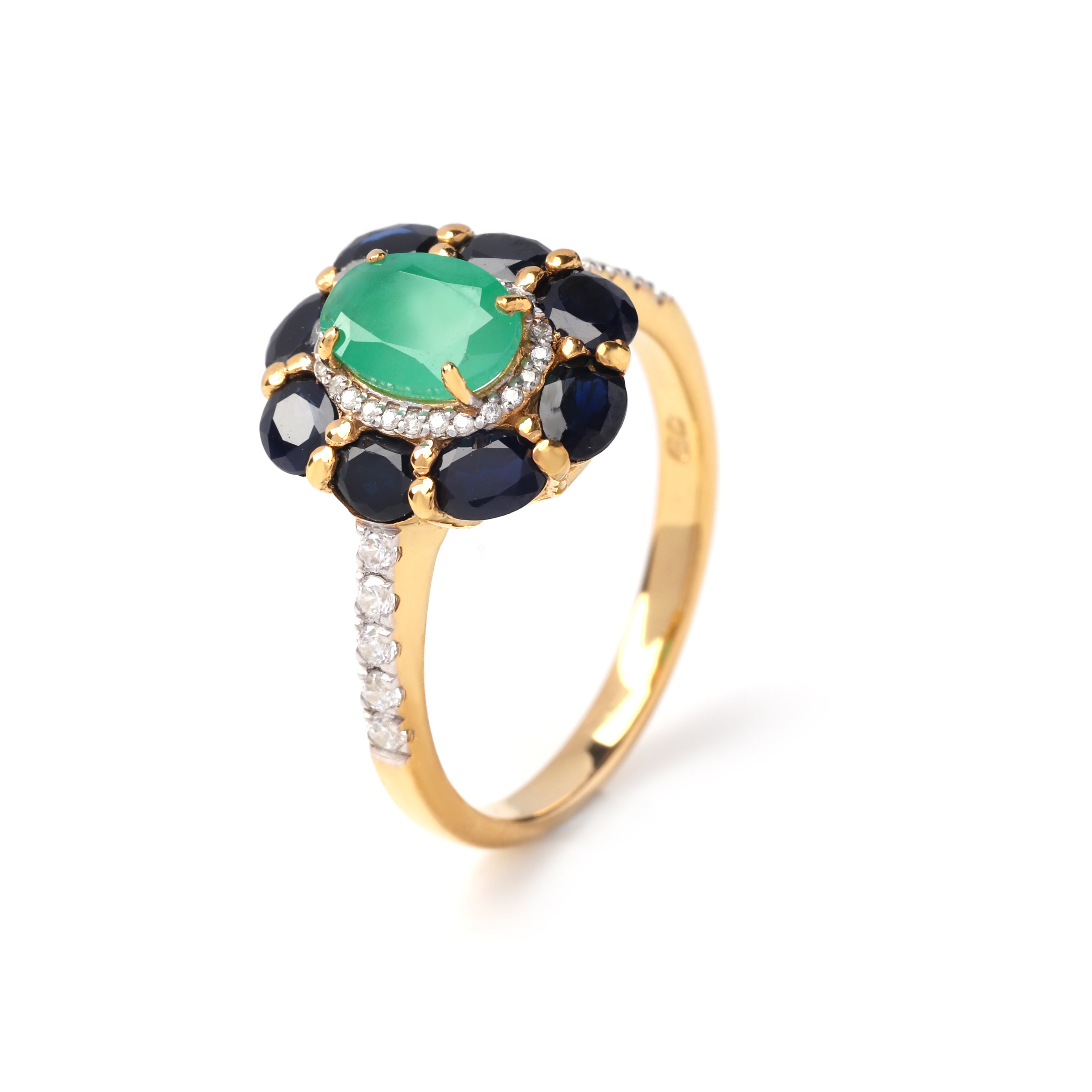 Side view emerald ring showing sapphire accents and pavé band in 925 sterling silver
