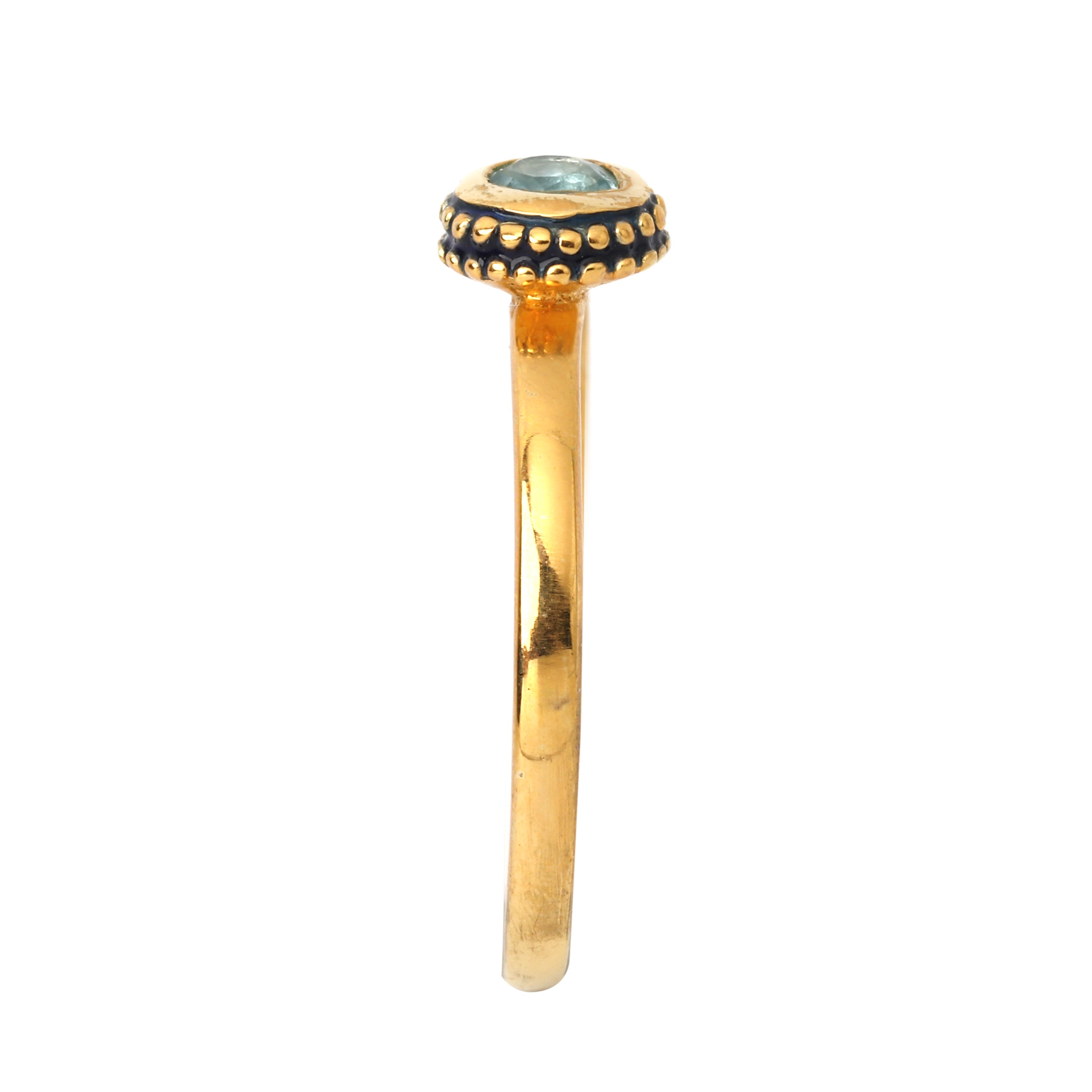 Handcrafted blue topaz ring with black enamel accents
