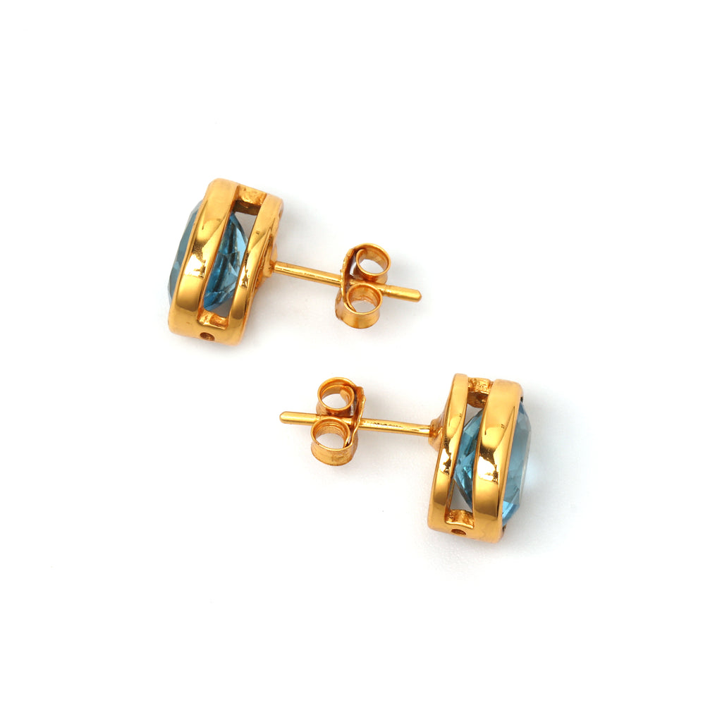 Modern oval blue topaz earrings crafted in 925 sterling silver