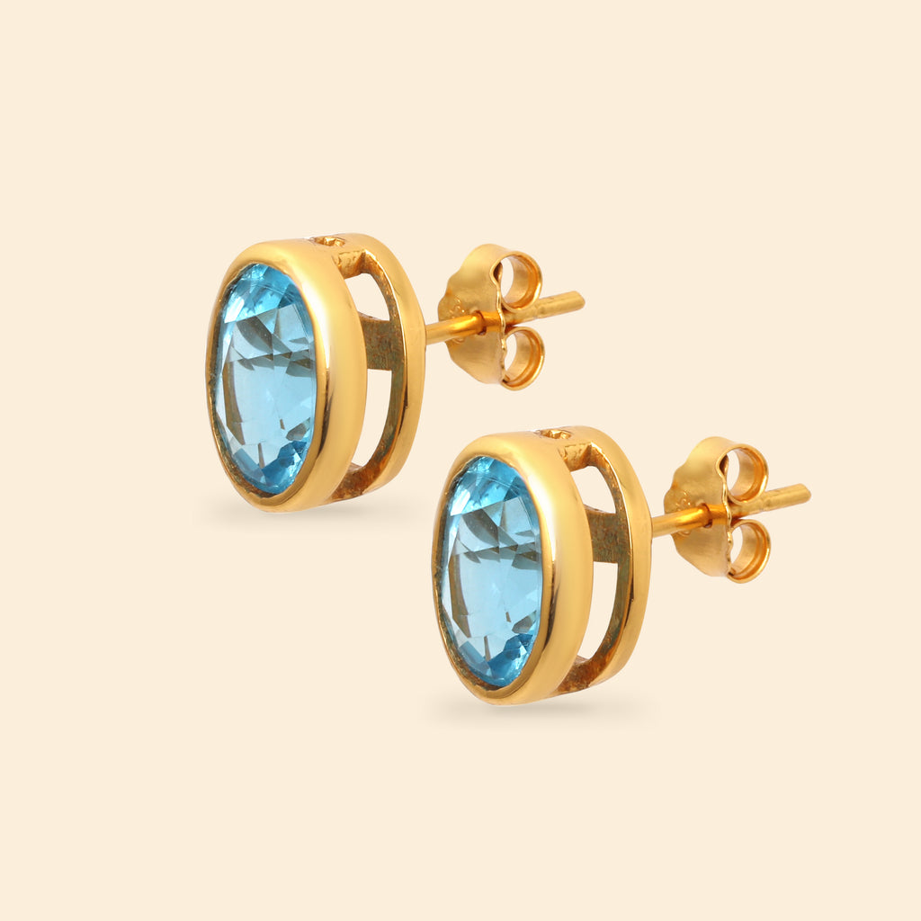 Elegant blue topaz oval stud earrings with gold plated finish