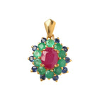 Gold pendant with ruby, emerald, and sapphire gemstones in floral design