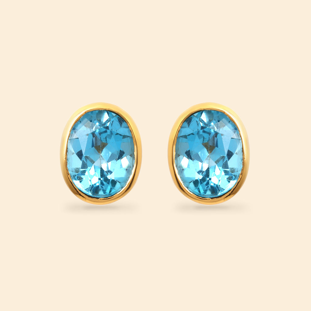 Oval blue topaz stud earrings in 14K gold plated 925 sterling silver