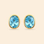 Oval blue topaz stud earrings in gold setting, handcrafted gemstone jewelry