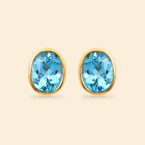 Oval blue topaz stud earrings in 14K gold plated 925 sterling silver