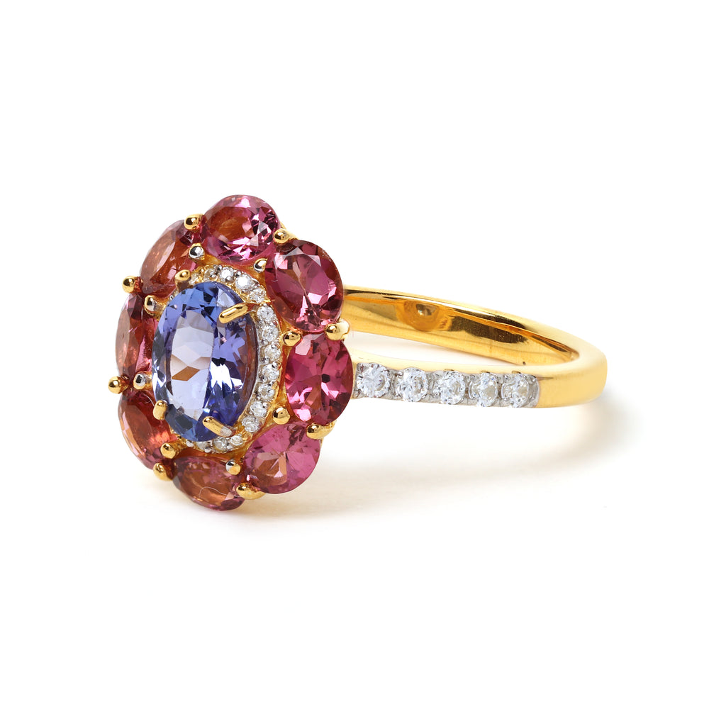 Elegant blue tanzanite ring with pink tourmaline halo gemstones