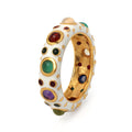 White enamel bangle with gold accents and colorful gemstones, handcrafted jewelry