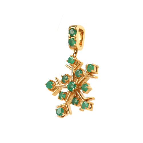 Prong-set emerald gemstone pendant with geometric snowflake design in gold-finished silver