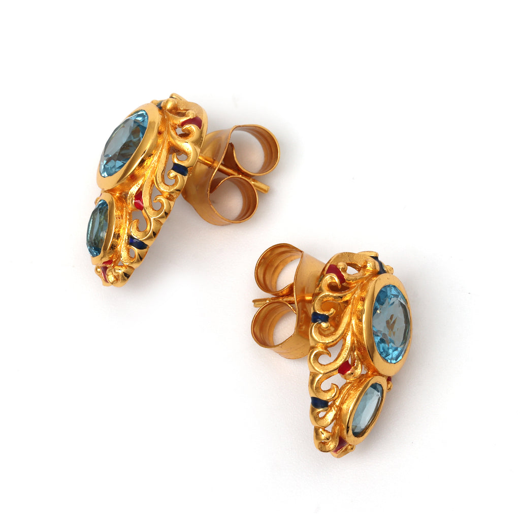 Elegant blue topaz gemstone earrings with intricate gold detailing