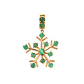 Close-up of emerald snowflake pendant in 925 sterling silver with gold finish by Jewelry by Crimson