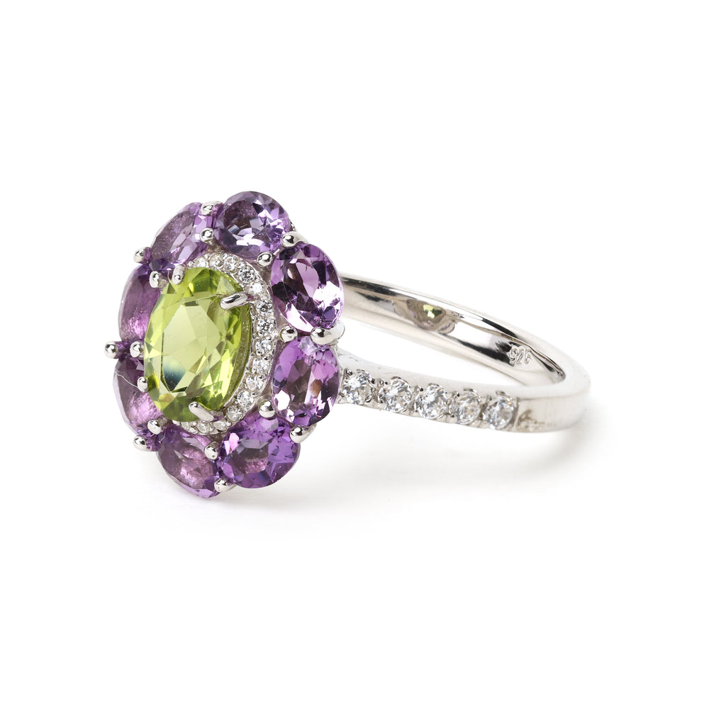 Silver plated peridot ring with amethyst gemstone halo