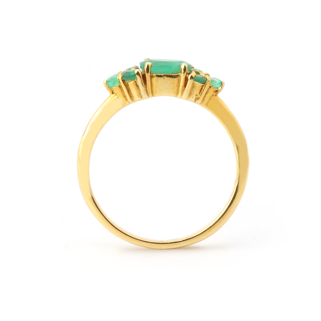 Fine emerald ring with multi stone detailing