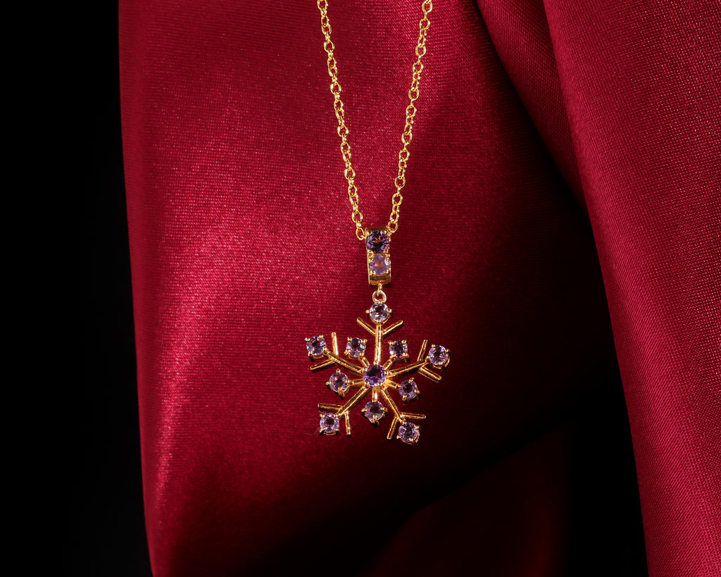 Amethyst snowflake pendant in gold plated silver — packaging view