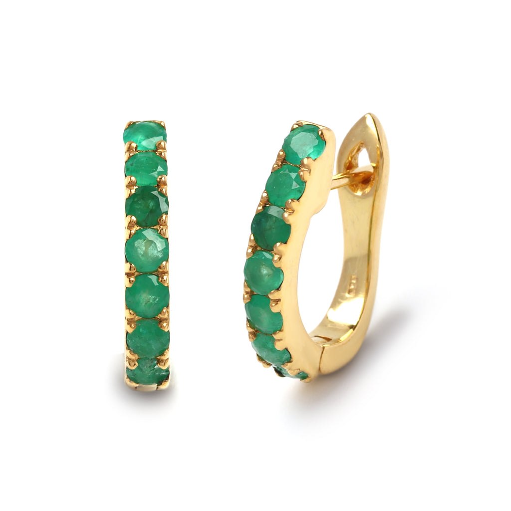 Close-up of 925 sterling silver emerald hoop earrings with gold finish by Jewelry by Crimson