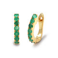 Close-up of 925 sterling silver emerald hoop earrings with gold finish by Jewelry by Crimson