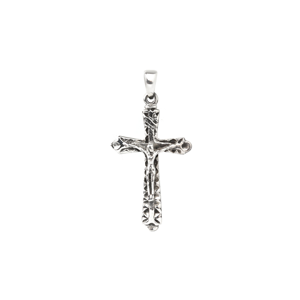 Close-up of 925 sterling silver cross pendant with textured finish and polished edges by Jewelry by Crimson