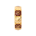 Gold ring with red and white enamel geometric patterns, elegant handcrafted design