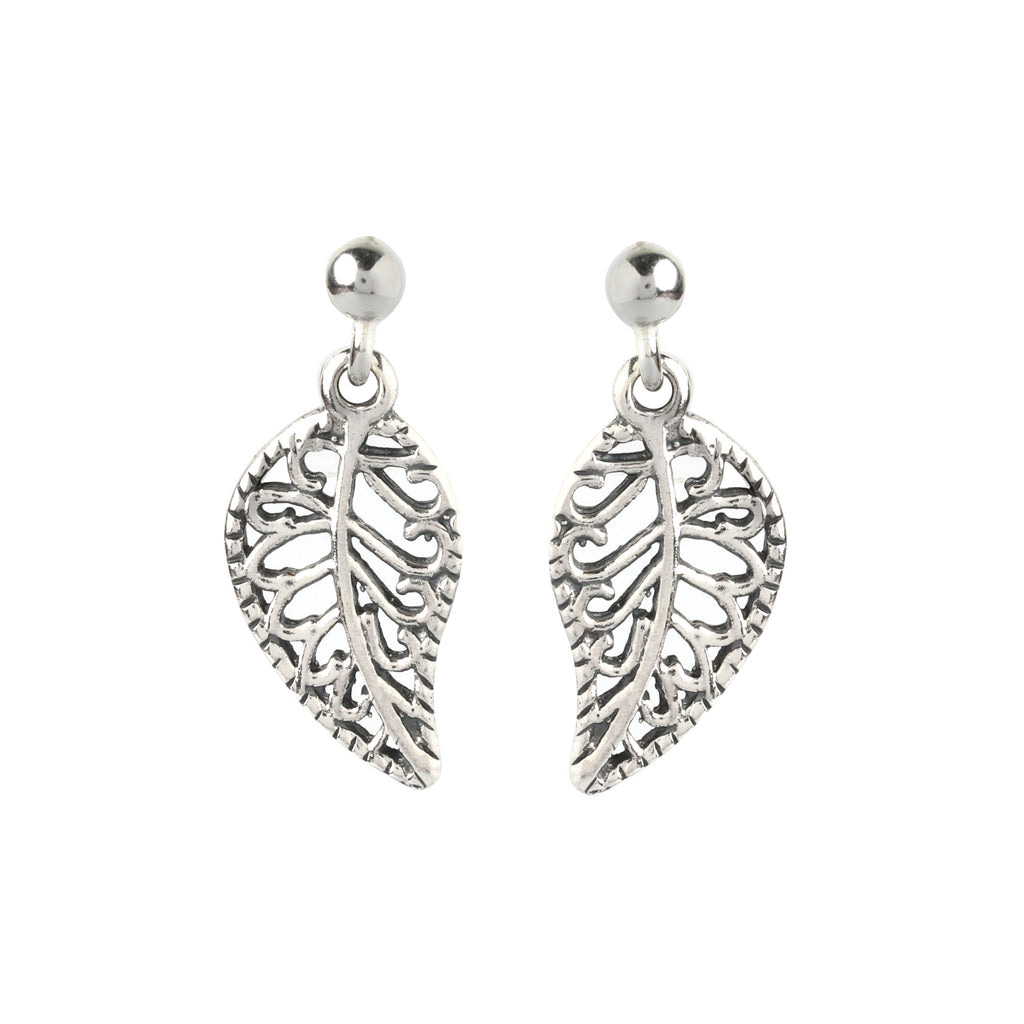 Close-up of leaf-shaped 925 sterling silver drop earrings with openwork detailing by Jewelry by Crimson