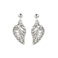 Close-up of leaf-shaped 925 sterling silver drop earrings with openwork detailing by Jewelry by Crimson