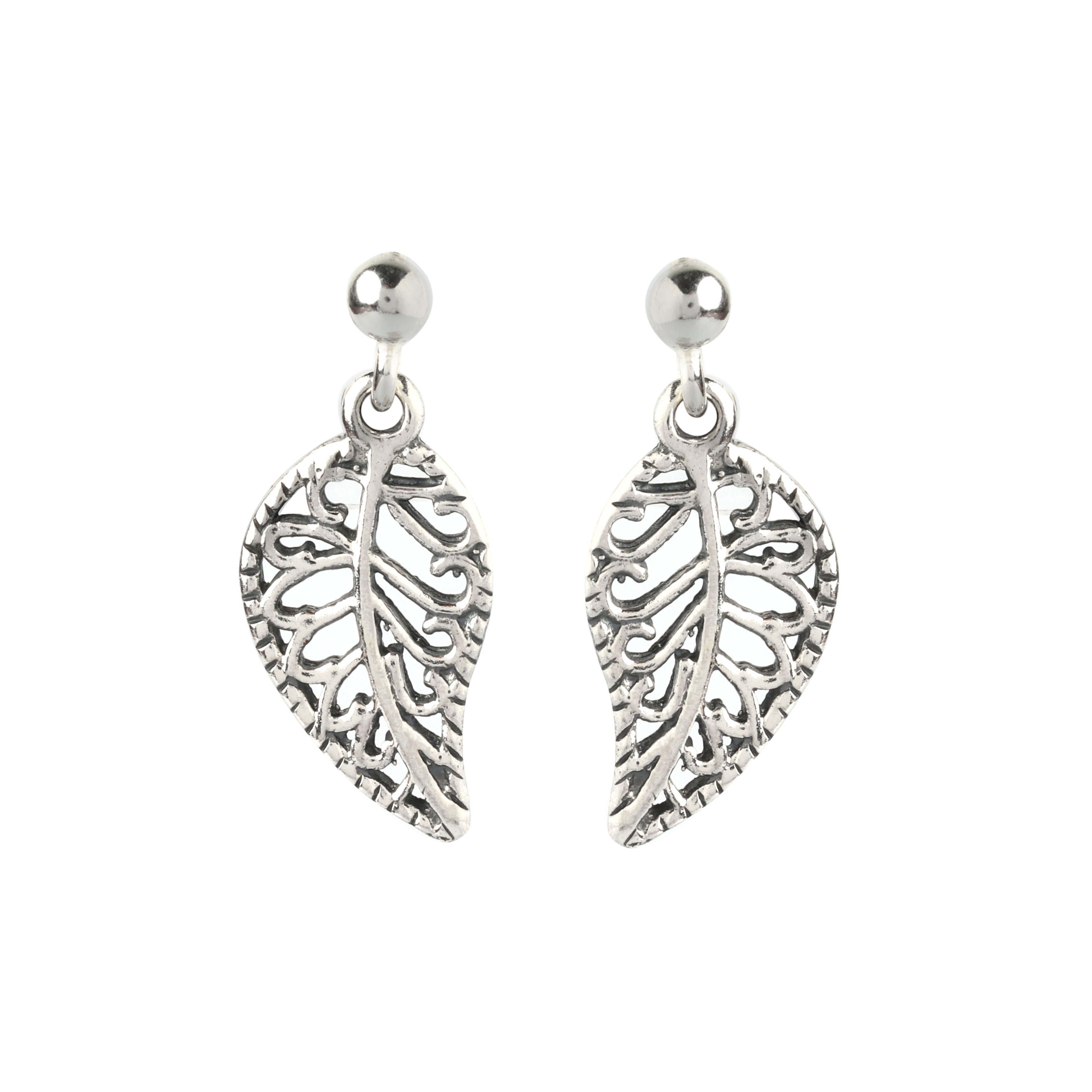 Close-up of leaf-shaped 925 sterling silver drop earrings with openwork detailing by Jewelry by Crimson
