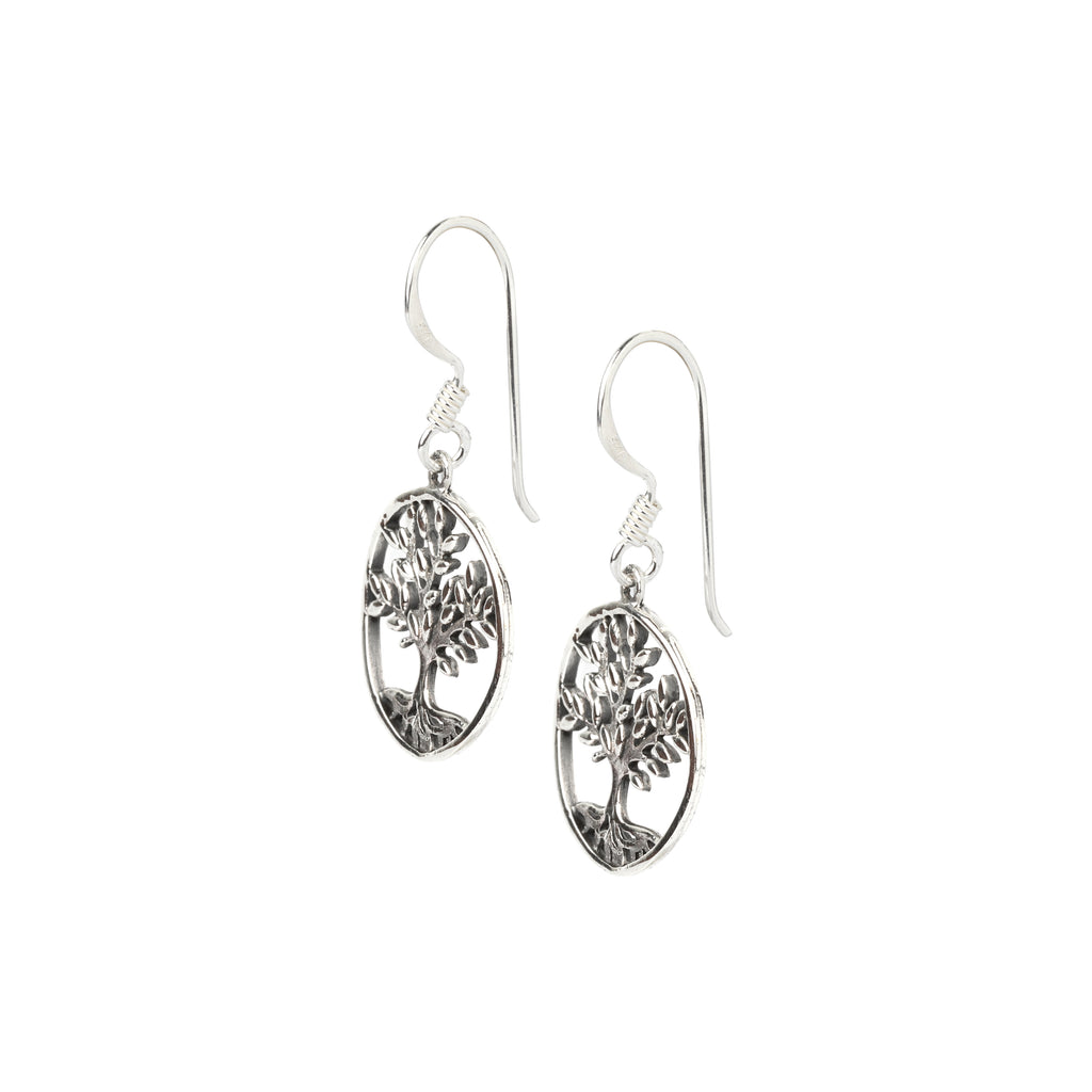 Side view of lightweight tree design silver dangle earrings with fishhook ear wires