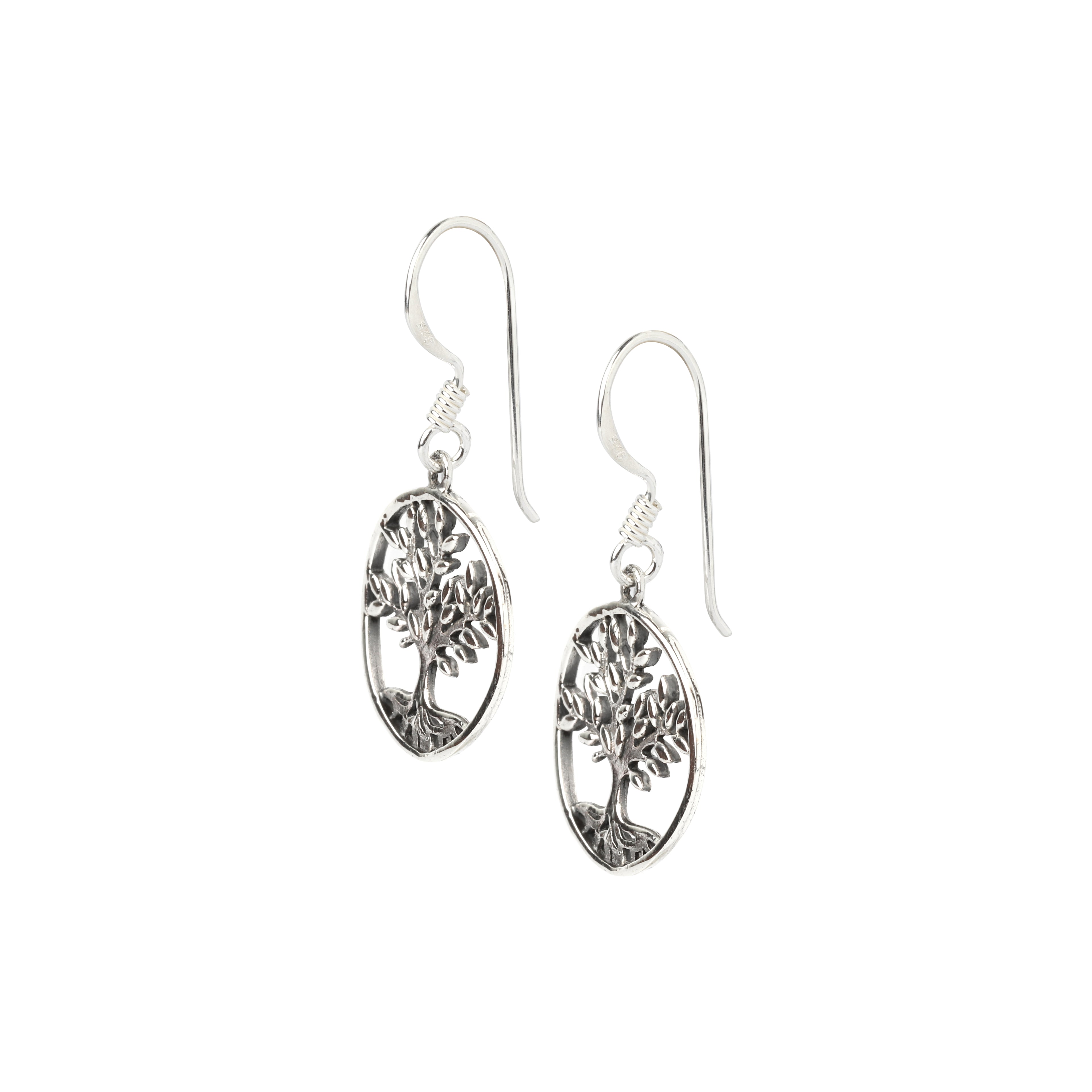 Side view of lightweight tree design silver dangle earrings with fishhook ear wires