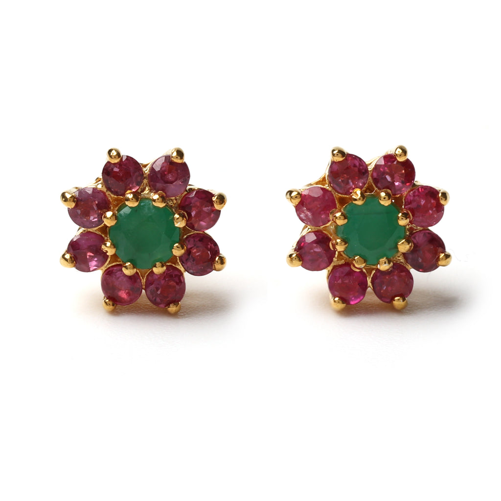 Close-up of emerald & ruby stud earrings in 925 sterling silver with gold finish by Jewelry by Crimson